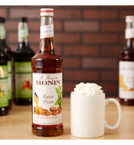 Load image into Gallery viewer, Monin Premium Butter Pecan Flavoring Syrup 750 mL
