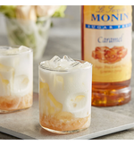 Load image into Gallery viewer, Monin Sugar Free Caramel Flavoring Syrup 1 Liter
