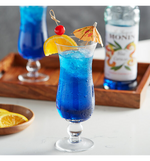 Load image into Gallery viewer, Monin Premium Blue Curacao Flavoring Syrup 750 mL
