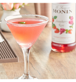 Load image into Gallery viewer, Monin Premium Strawberry Rose Flavoring Syrup 750 mL
