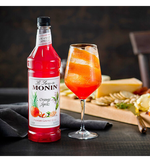 Load image into Gallery viewer, Monin Premium Orange Spritz Flavoring Syrup 1 Liter
