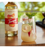 Load image into Gallery viewer, Torani Puremade White Peach Flavoring Syrup 750 mL
