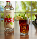 Load image into Gallery viewer, Torani Puremade Pure Cane Sugar Flavoring Syrup 750 mL Plastic Bottle
