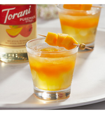 Load image into Gallery viewer, Torani Puremade Mango Flavoring Syrup 750 mL

