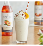 Load image into Gallery viewer, Capora Peach Flavoring Syrup 750 mL
