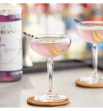 Load image into Gallery viewer, Monin Premium Lavender Flavoring Syrup 1 Liter
